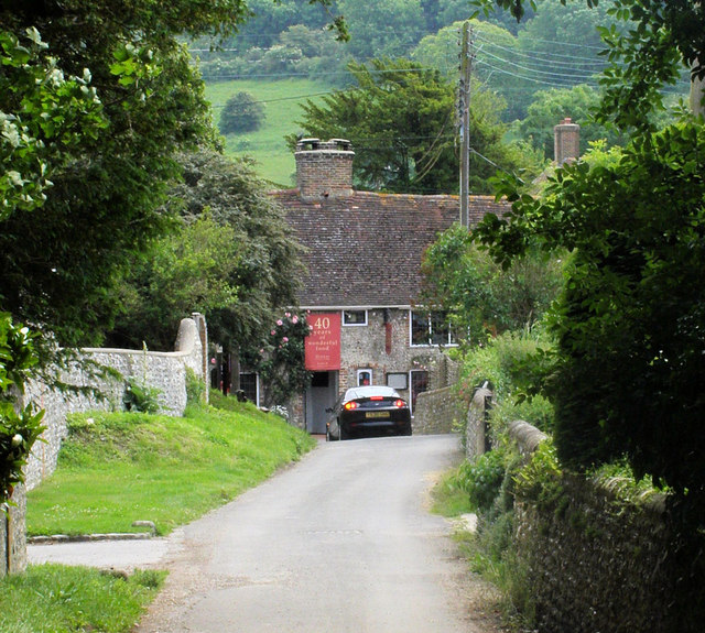 The Hungry Monk restaurant, a flint cottage on Jevington Road, seen from the lane in 2008