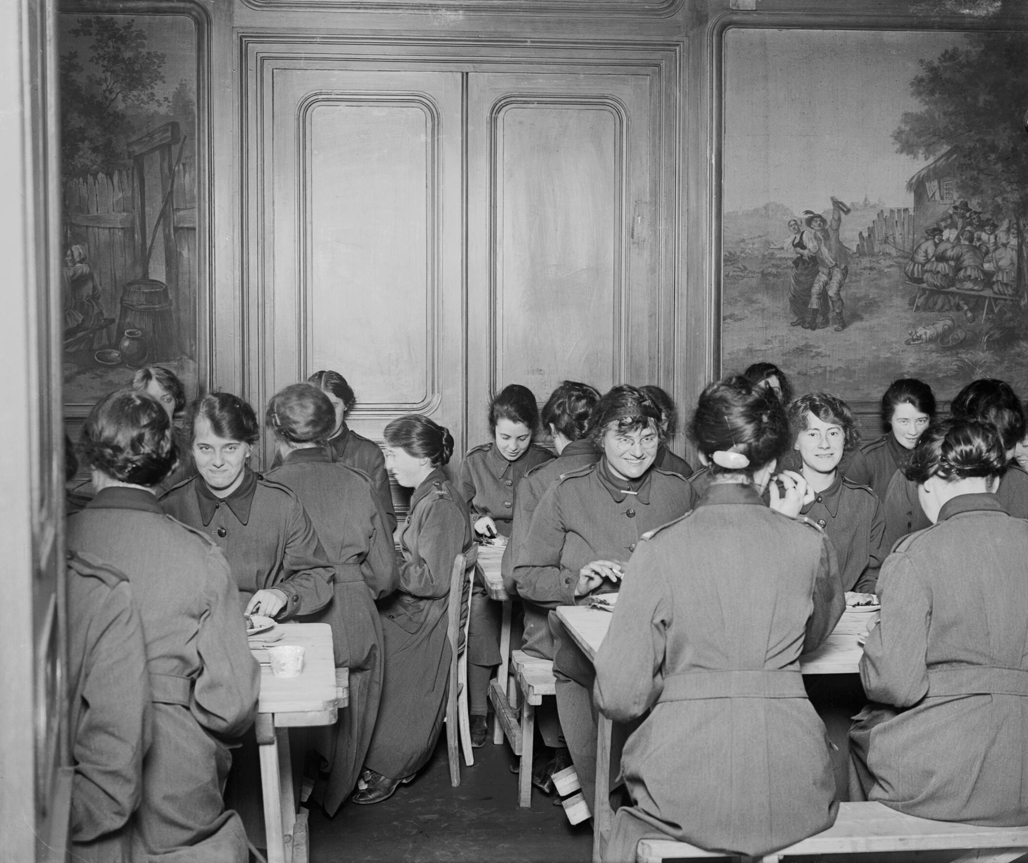 Members of the Women's Army Auxiliary Corps dining in their mess room at Rouen, France, during the First World War